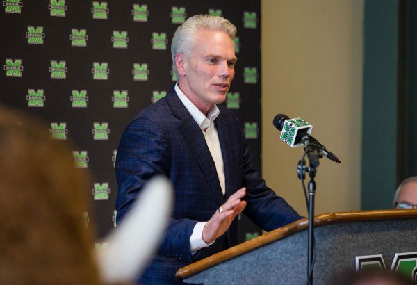 Brad D. Smith speaking at a press conference at Marshall University.