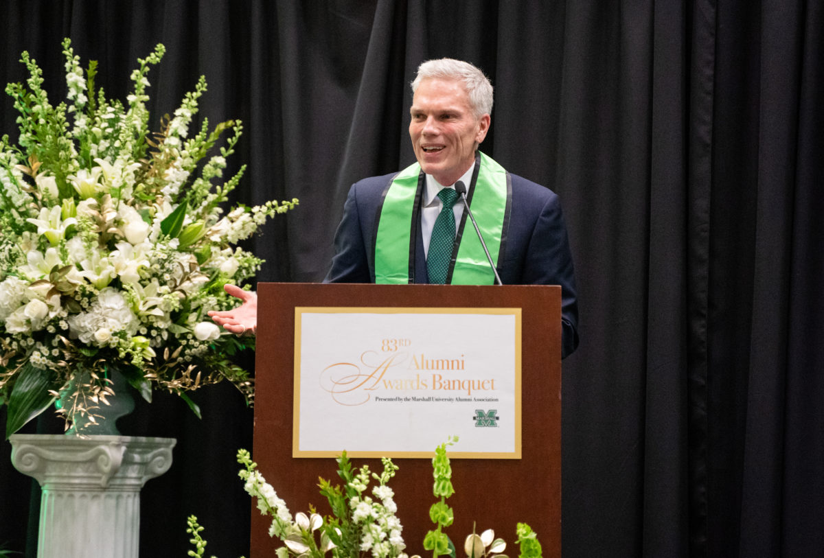 Brad D. Smith at a podium at the Marshall University 83rd Alumni Awards Banquet event