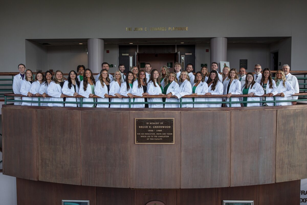 Students pose for a photo at the Joan C. Edwards School of Medicine's 4th Annual Physician Assistant White Coat Ceremony.